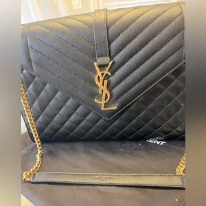 Brand New YSL Yves Saint Laurent pocketbook. Never worn
